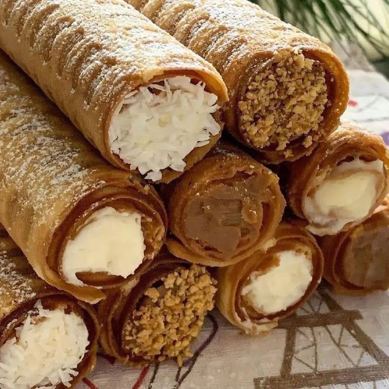 Приготовление трубочек со сгущенкой Ингредиенты:2 яйца100 г сахара100 г сливочно...